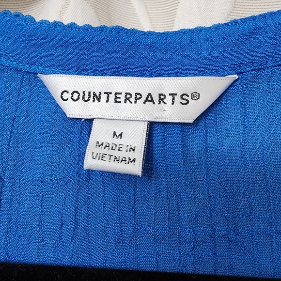 Counterparts ☆  Blue Smocked Tie Front Sleeveless Blouse. 62% Rayon 38% Poly - Picture 3 of 9